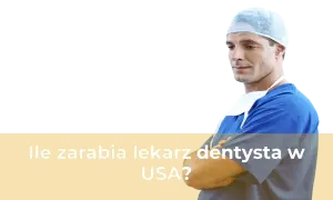 Lekarz dentysta w niebieskim uniformie i czepku, z rękami skrzyżowanymi na piersi.